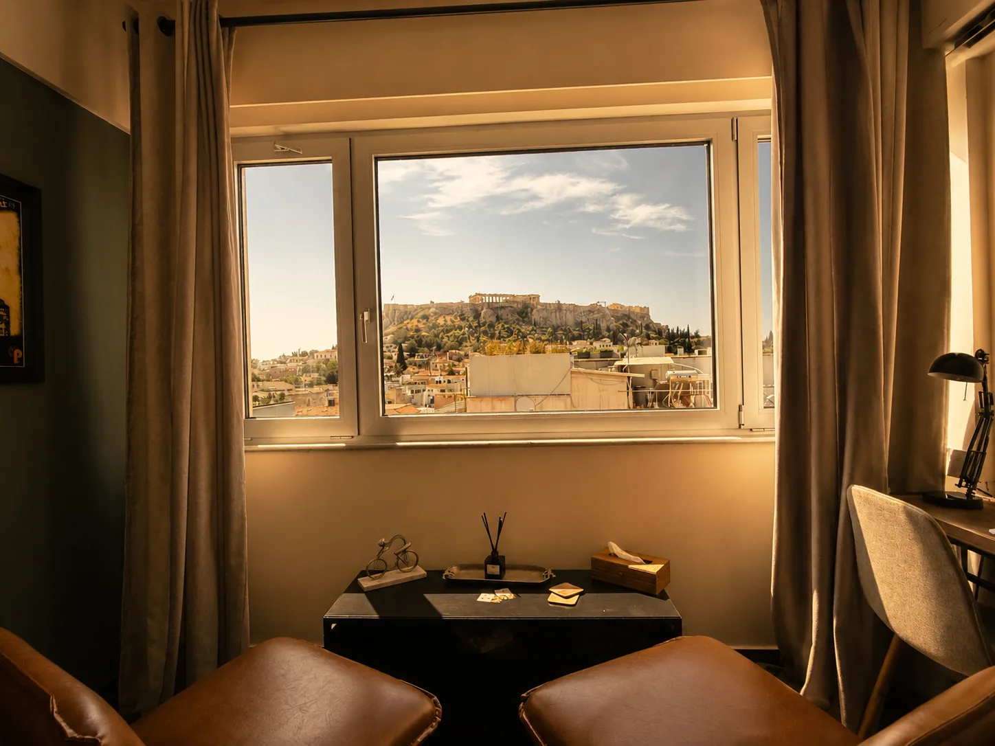 Acropolis view from the Superior Suite with a sitting area at Elite Ermou Suites, Athens